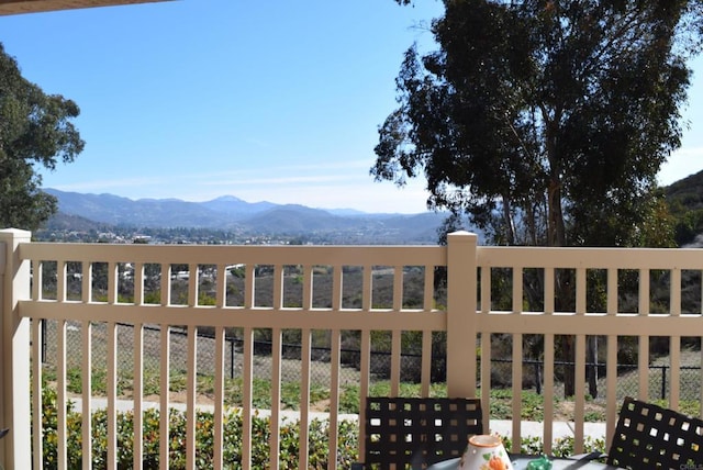 balcony featuring a mountain view