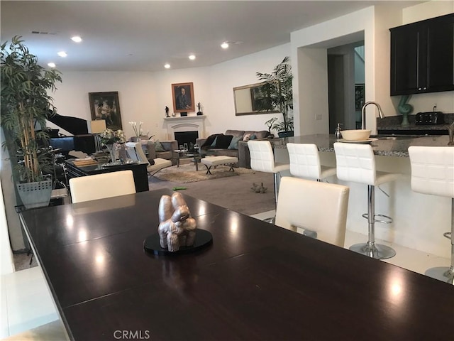 dining room featuring sink