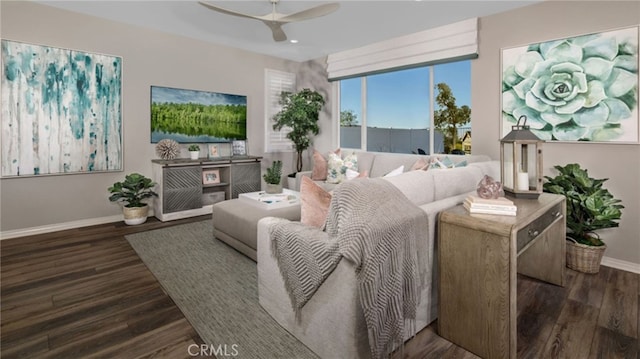 living room featuring dark wood-type flooring and ceiling fan