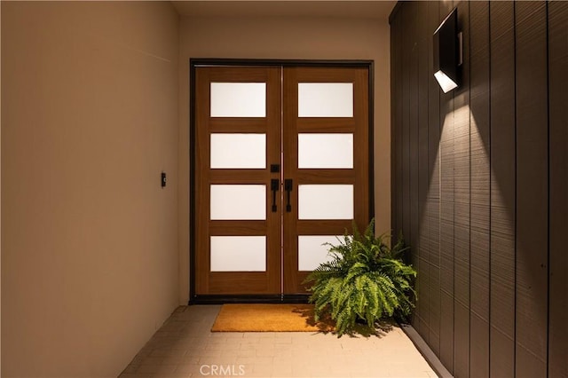 doorway to property featuring french doors