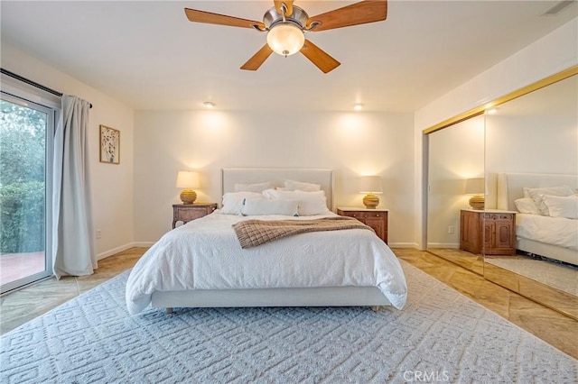 bedroom featuring access to outside and ceiling fan