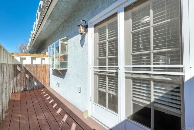 view of wooden balcony featuring a wooden deck