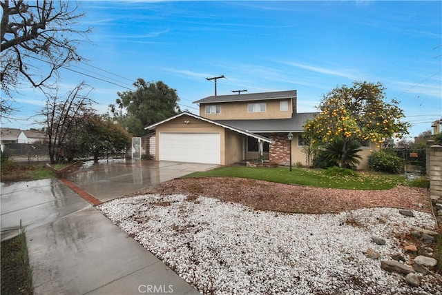 front of property featuring a front yard and a garage