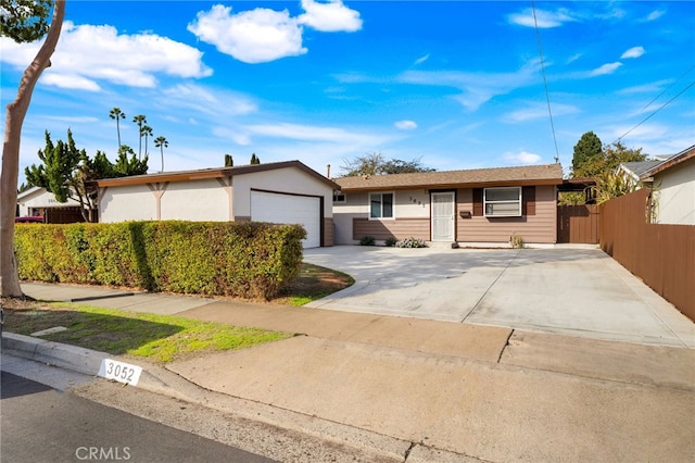 single story home featuring a garage