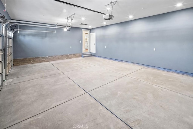 garage featuring a garage door opener