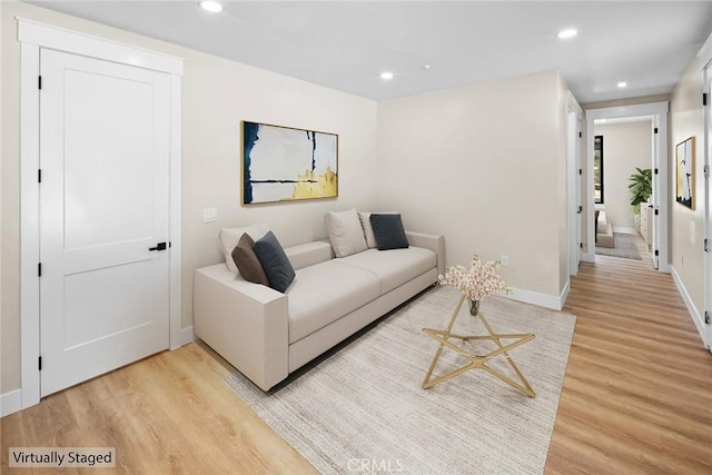 living room featuring light wood-type flooring
