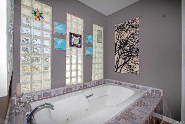 bathroom featuring tiled bath