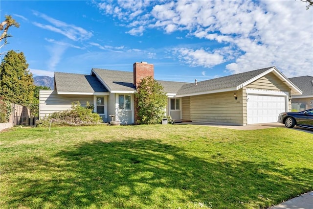 ranch-style house featuring a garage, a chimney, fence, and a front yard