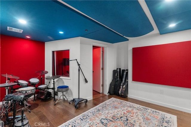 game room featuring dark hardwood / wood-style flooring