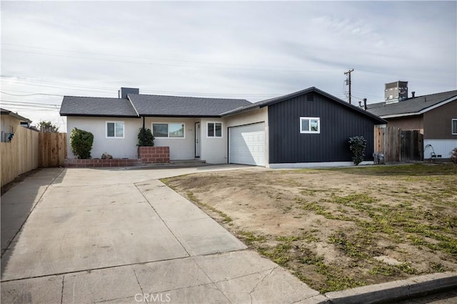 single story home with a garage