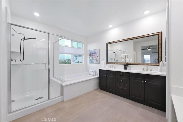 bathroom with vanity and plus walk in shower