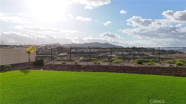 view of yard with a mountain view