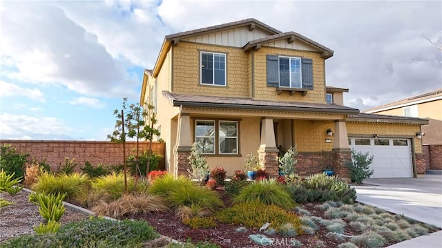 craftsman inspired home with a garage