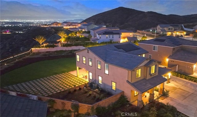 aerial view at dusk with a mountain view