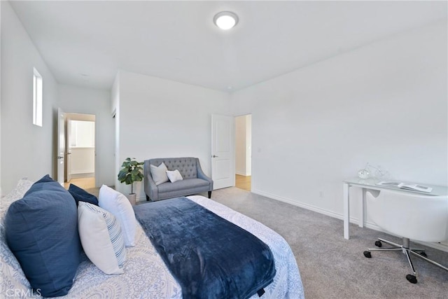 bedroom with light colored carpet