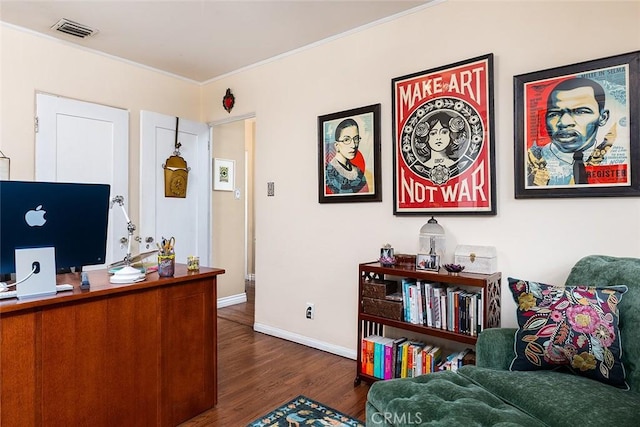 office space with dark wood-style floors, ornamental molding, visible vents, and baseboards