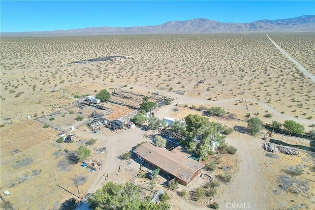 bird's eye view with a mountain view and a rural view