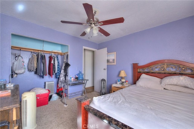 bedroom with carpet flooring, ceiling fan, and a closet