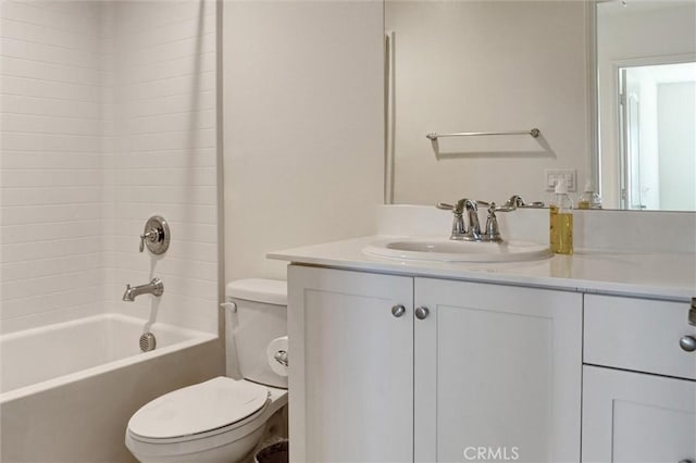 full bath with vanity, toilet, and shower / tub combination