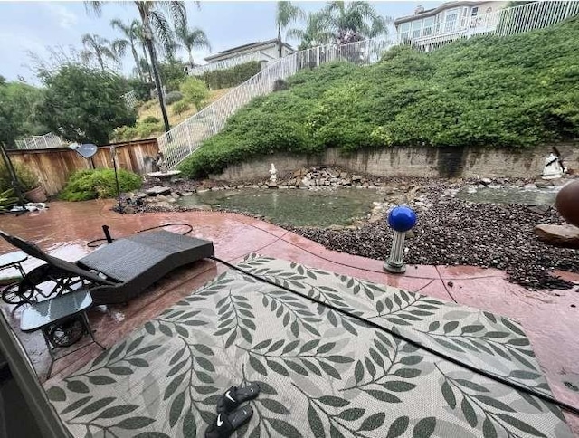 view of patio featuring a fenced backyard