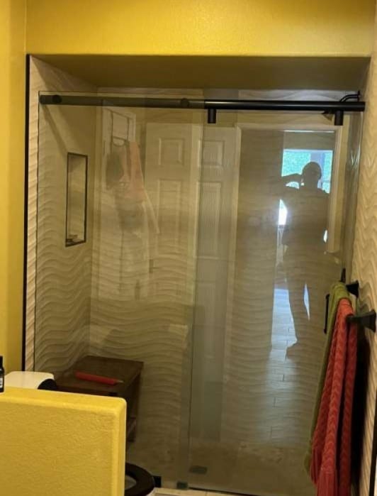 bathroom with a stall shower