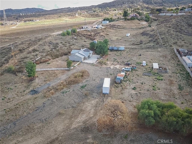 bird's eye view featuring a mountain view and a rural view