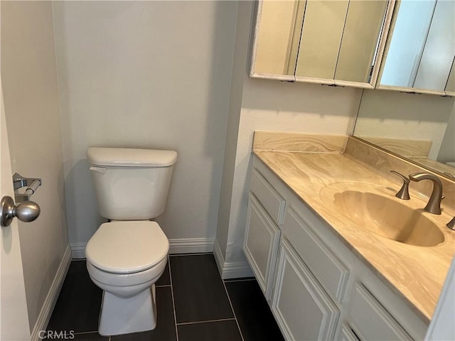 7422UNIT7 Hazeltine Ave Unit 7, Van Nuys, CA 91405 - bathroom with baseboards, toilet, vanity, and tile patterned floors