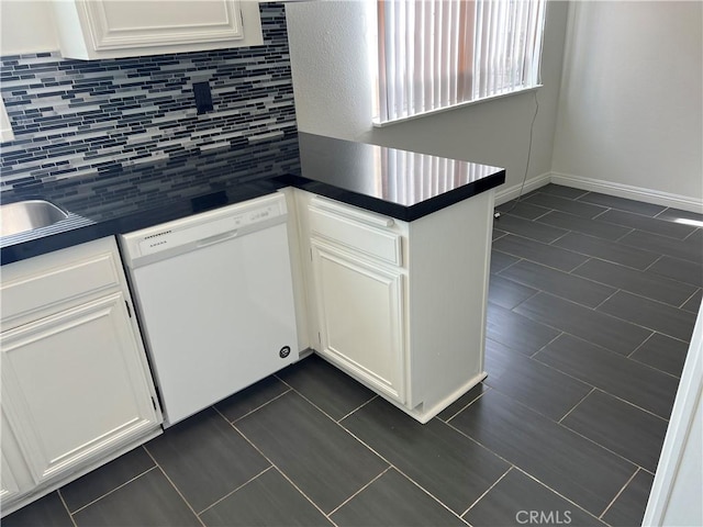 7422UNIT7 Hazeltine Ave Unit 7, Van Nuys, CA 91405 - kitchen featuring white dishwasher, dark countertops, tasteful backsplash, and white cabinets