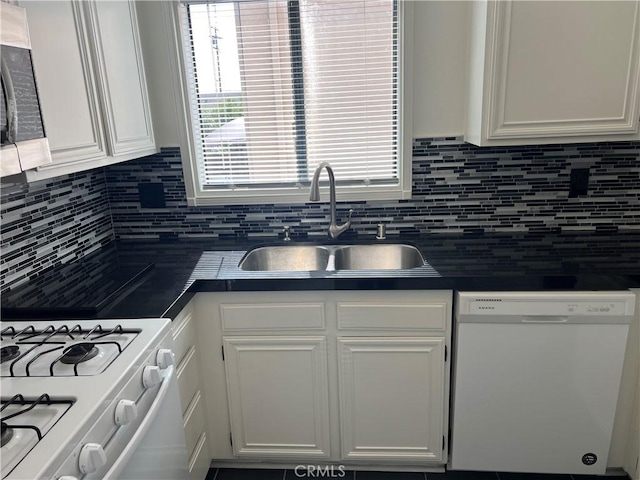 7422UNIT7 Hazeltine Ave Unit 7, Van Nuys, CA 91405 - kitchen featuring white appliances, a sink, dark countertops, and white cabinetry