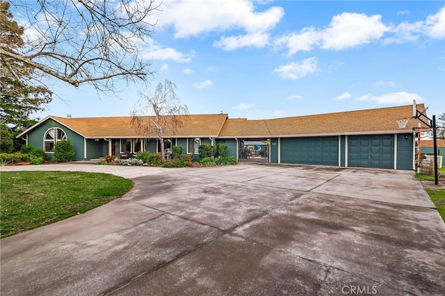 ranch-style house featuring a garage