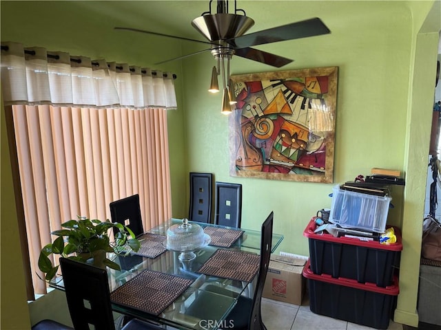 1408 S Burris Ave, Compton, CA 90221 - dining area with ceiling fan and tile patterned flooring