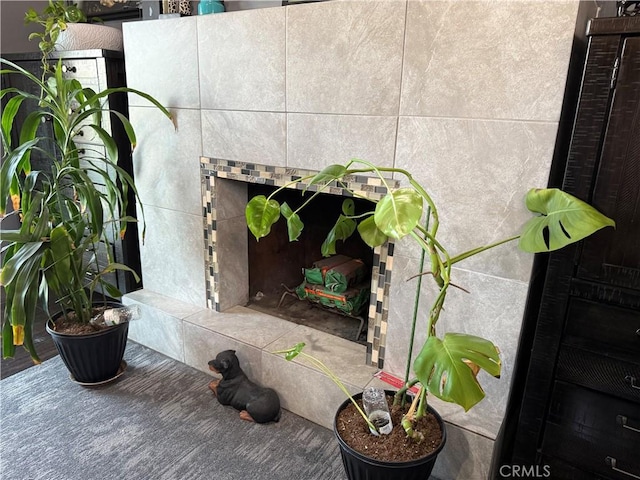 1408 S Burris Ave, Compton, CA 90221 - detailed view of a tile fireplace and carpet