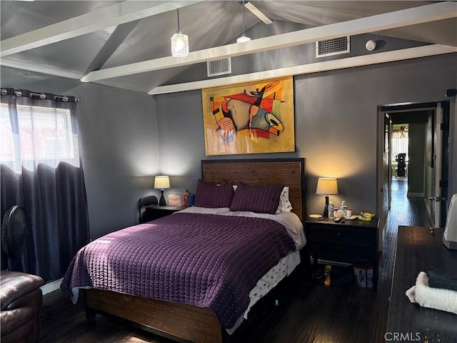 bedroom with vaulted ceiling with beams and hardwood / wood-style floors