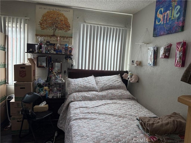 1408 S Burris Ave, Compton, CA 90221 - bedroom with a textured wall and a textured ceiling