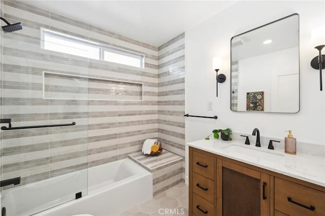 bathroom featuring vanity and shower / bath combination with glass door