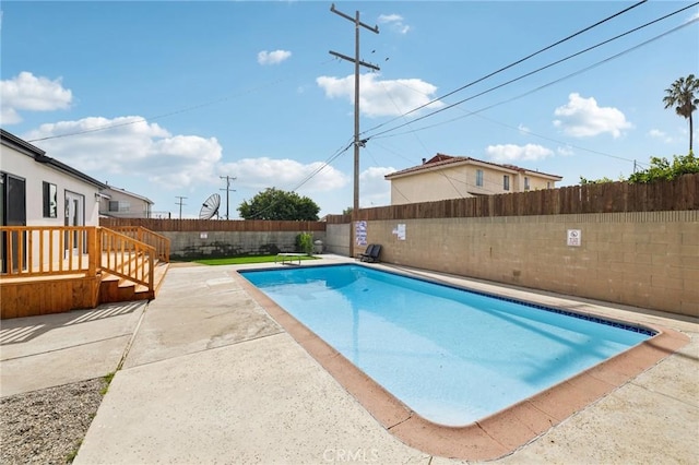 view of pool with a patio area