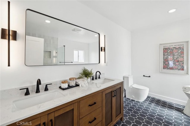 bathroom with vanity and toilet