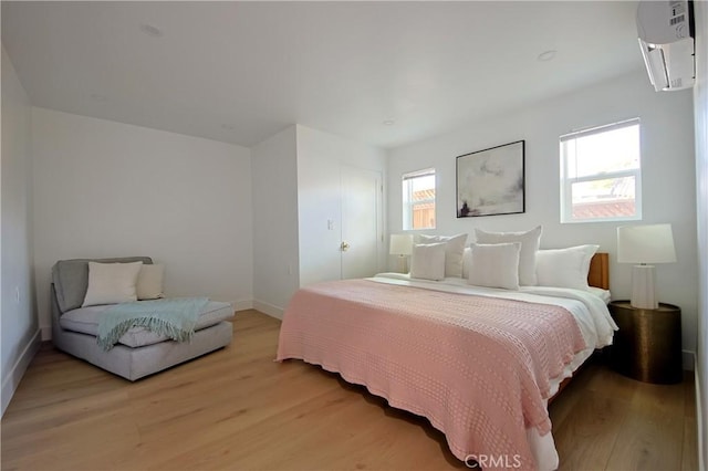 bedroom featuring light wood-type flooring