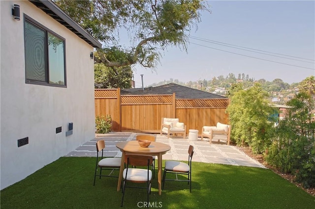 view of yard with a patio area
