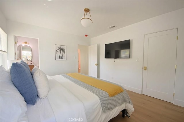 bedroom featuring light hardwood / wood-style flooring