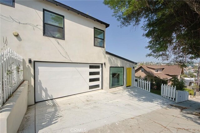view of home's exterior with a garage