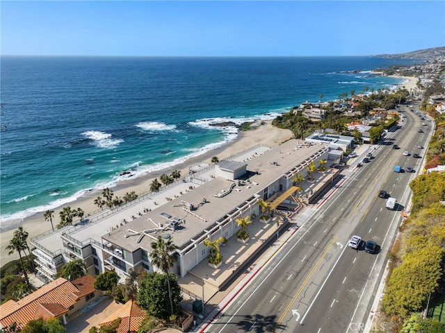 bird's eye view with a water view and a view of the beach