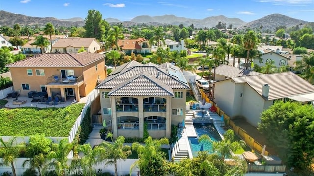 aerial view featuring a residential view and a mountain view