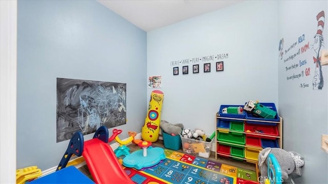 game room with baseboards