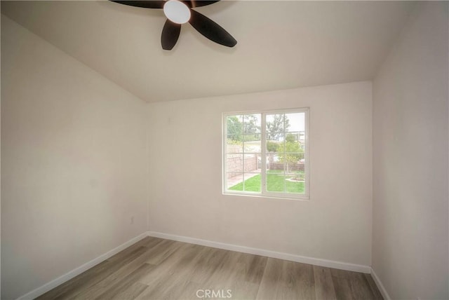 empty room with ceiling fan and light wood-type flooring