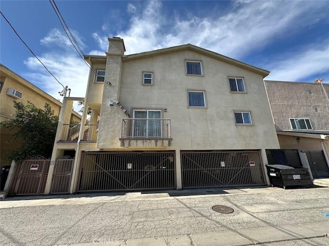 view of front of home with a balcony