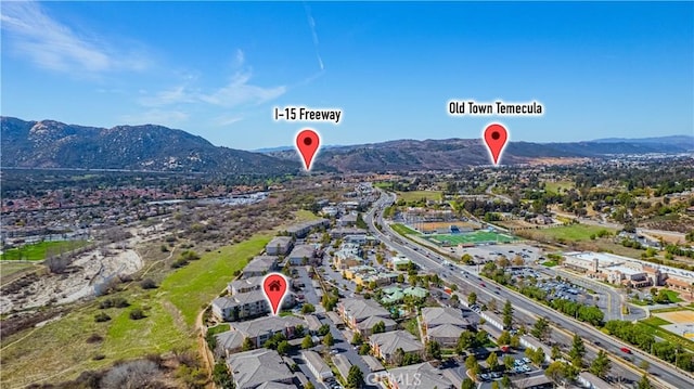 bird's eye view featuring a residential view and a mountain view