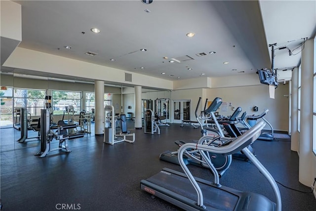 workout area with visible vents and recessed lighting