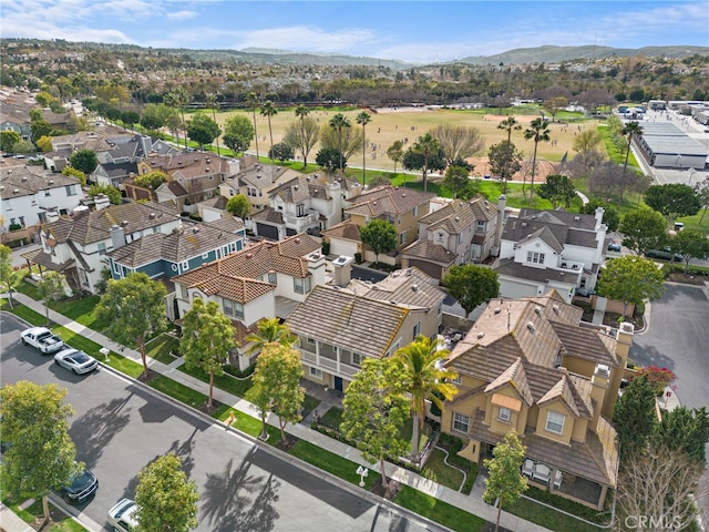 birds eye view of property featuring a mountain view