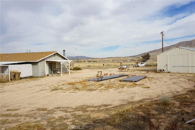 view of yard with a mountain view